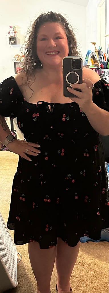 plus size woman black cherry dress mirror picture