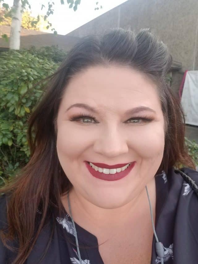 plus size model tish lee with hair and makeup done before fashion show